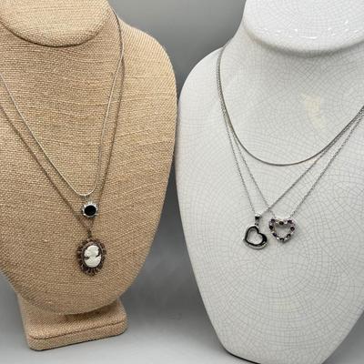 LOT 168: Necklaces: Cameo, Heart Pendants & More