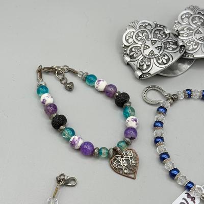 LOT 172: Collection of Charm & Beaded Bracelets