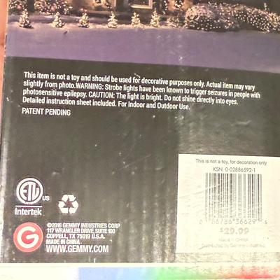 LOT 175: Tote full of White Tube & Red String Lights and a new Gemmy LED Lightshow Projection WHIRL-A-MOTION, heavy duty large tote...