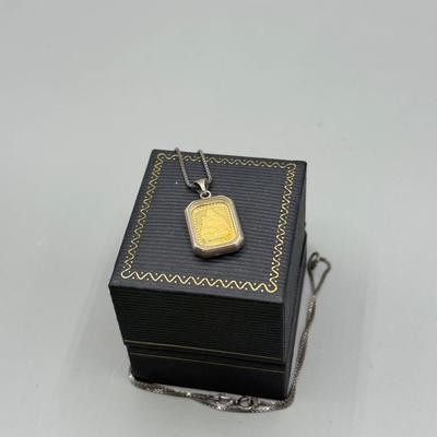 LOT 185: Sterling & Glass Encased Laughing Buddha .999 Gold Bar (4.9g) on 17” Sterling Chain (2.7g)