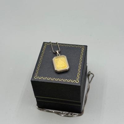 LOT 185: Sterling & Glass Encased Laughing Buddha .999 Gold Bar (4.9g) on 17” Sterling Chain (2.7g)