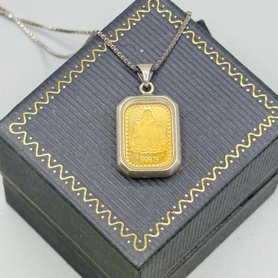 LOT 185: Sterling & Glass Encased Laughing Buddha .999 Gold Bar (4.9g) on 17” Sterling Chain (2.7g)