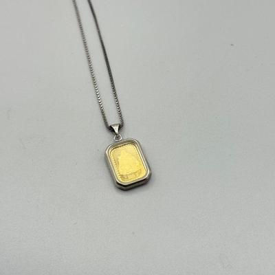 LOT 185: Sterling & Glass Encased Laughing Buddha .999 Gold Bar (4.9g) on 17” Sterling Chain (2.7g)