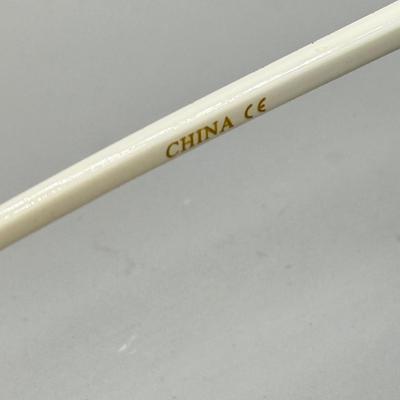 LOT 189: 1990s White Dolce & Gabbana Sunglasses