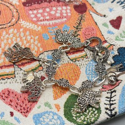 LOT 191: Elephant Themed Bag, Pouches & Jewelry