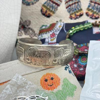 LOT 191: Elephant Themed Bag, Pouches & Jewelry