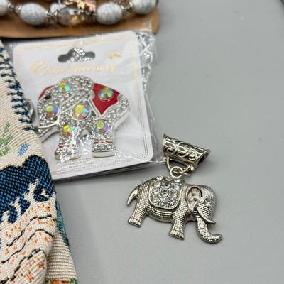 LOT 191: Elephant Themed Bag, Pouches & Jewelry