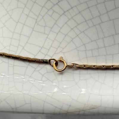 LOT 196: 23” 14kt Gold Chain (5.4g)