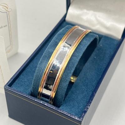 LOT 202: Swarovski Crystal Earrings and Bradford Exchange Copper Bracelet - in Original Boxes