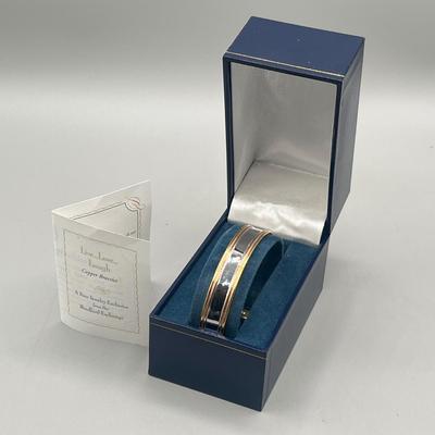 LOT 202: Swarovski Crystal Earrings and Bradford Exchange Copper Bracelet - in Original Boxes