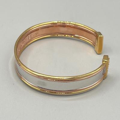 LOT 202: Swarovski Crystal Earrings and Bradford Exchange Copper Bracelet - in Original Boxes