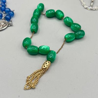 LOT 209: Religious Jewelry Collection - Rosaries, Medallions and More