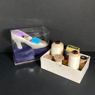 LOT 71: Vintage Collection - Sewing Notions, Cast Iron Trivet, Wall Plaque and Crystal / Milk Glass Bud Vases