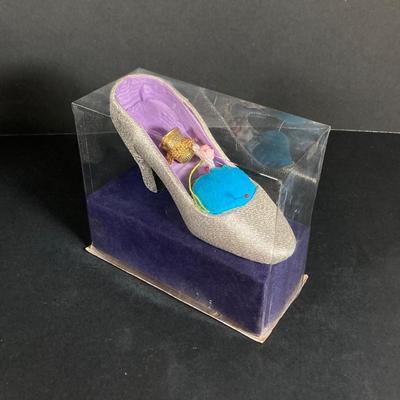 LOT 71: Vintage Collection - Sewing Notions, Cast Iron Trivet, Wall Plaque and Crystal / Milk Glass Bud Vases