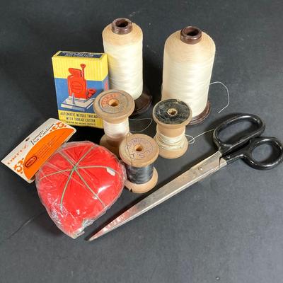 LOT 71: Vintage Collection - Sewing Notions, Cast Iron Trivet, Wall Plaque and Crystal / Milk Glass Bud Vases