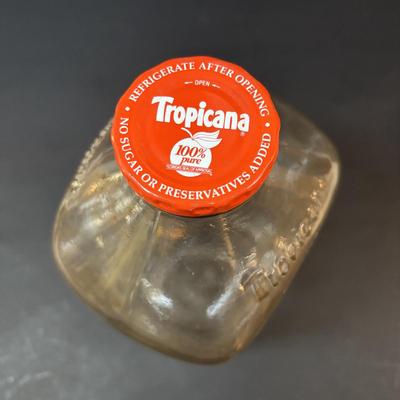 LOT 82: Vintage Florida Souvenirs: "The Sunshine State" Juice Glasses, TV Salt/Pepper Shakers Disney Jars along with a...