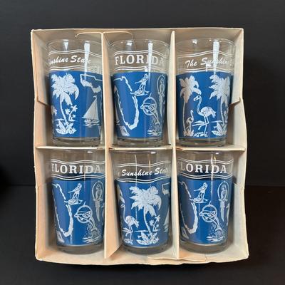 LOT 82: Vintage Florida Souvenirs: "The Sunshine State" Juice Glasses, TV Salt/Pepper Shakers Disney Jars along with a...
