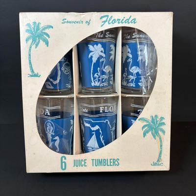 LOT 82: Vintage Florida Souvenirs: "The Sunshine State" Juice Glasses, TV Salt/Pepper Shakers Disney Jars along with a...