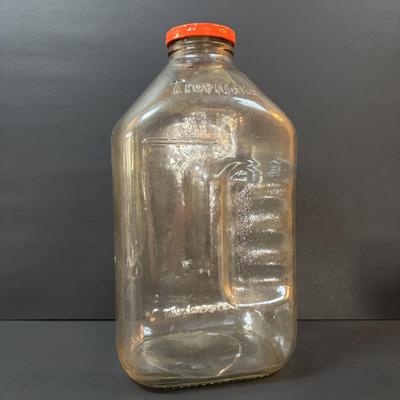 LOT 82: Vintage Florida Souvenirs: "The Sunshine State" Juice Glasses, TV Salt/Pepper Shakers Disney Jars along with a...