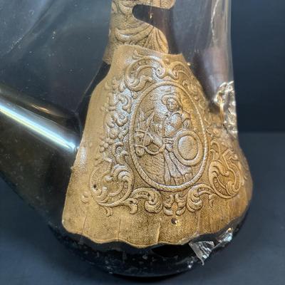 LOT 87: Vintage Hand-Blown Green Glass Wine Decanter & Leather Covered Embossed Spanish Wine Decanter along with Romania Arcadia Crystal