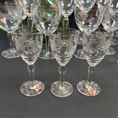 LOT 87: Vintage Hand-Blown Green Glass Wine Decanter & Leather Covered Embossed Spanish Wine Decanter along with Romania Arcadia Crystal