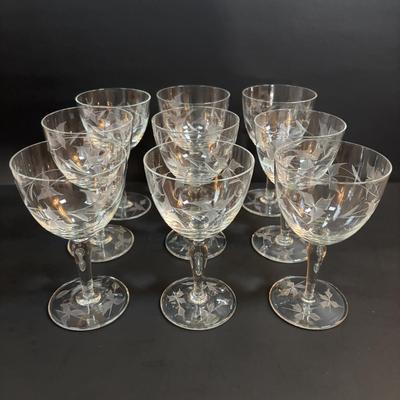 LOT 87: Vintage Hand-Blown Green Glass Wine Decanter & Leather Covered Embossed Spanish Wine Decanter along with Romania Arcadia Crystal