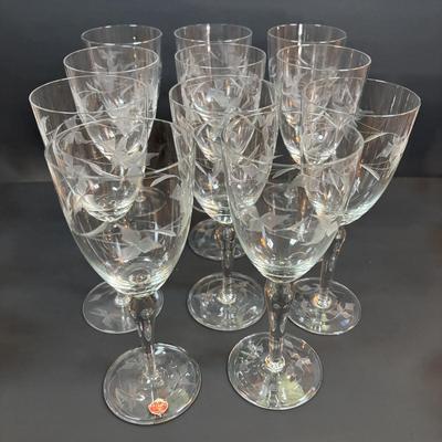 LOT 87: Vintage Hand-Blown Green Glass Wine Decanter & Leather Covered Embossed Spanish Wine Decanter along with Romania Arcadia Crystal