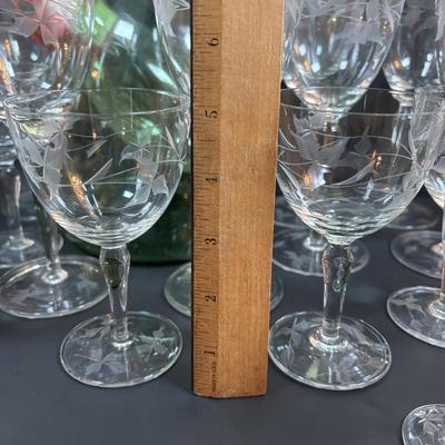 LOT 87: Vintage Hand-Blown Green Glass Wine Decanter & Leather Covered Embossed Spanish Wine Decanter along with Romania Arcadia Crystal