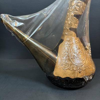 LOT 87: Vintage Hand-Blown Green Glass Wine Decanter & Leather Covered Embossed Spanish Wine Decanter along with Romania Arcadia Crystal