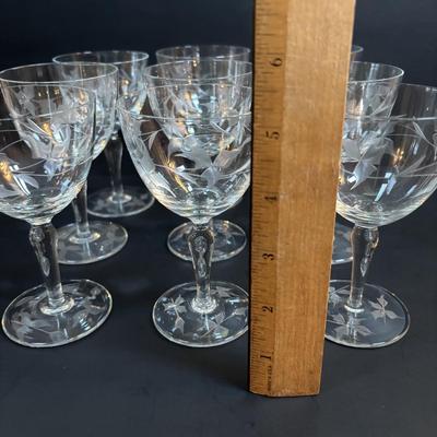 LOT 87: Vintage Hand-Blown Green Glass Wine Decanter & Leather Covered Embossed Spanish Wine Decanter along with Romania Arcadia Crystal