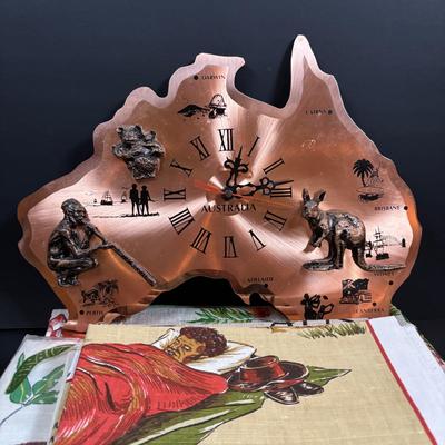 LOT 96: Australia Souvenirs: Copper Faced Clock, Table Linens, Tea Towels, Embossed Wallet, Key Holder