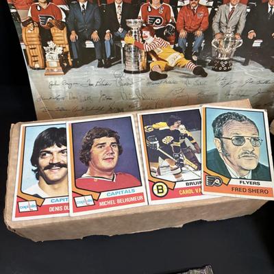 LOT 102: Vintage Philadelphia Flyers Memorabilia: T-shirts, Trading Cards, Team Photos, Stanley Cup Magazine along with a Box of Mixed...