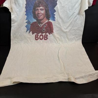 LOT 102: Vintage Philadelphia Flyers Memorabilia: T-shirts, Trading Cards, Team Photos, Stanley Cup Magazine along with a Box of Mixed...