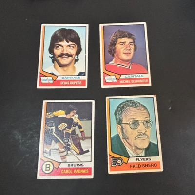 LOT 102: Vintage Philadelphia Flyers Memorabilia: T-shirts, Trading Cards, Team Photos, Stanley Cup Magazine along with a Box of Mixed...