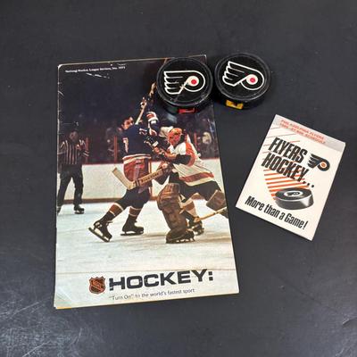 LOT 102: Vintage Philadelphia Flyers Memorabilia: T-shirts, Trading Cards, Team Photos, Stanley Cup Magazine along with a Box of Mixed...