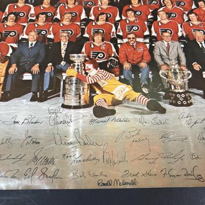 LOT 102: Vintage Philadelphia Flyers Memorabilia: T-shirts, Trading Cards, Team Photos, Stanley Cup Magazine along with a Box of Mixed...