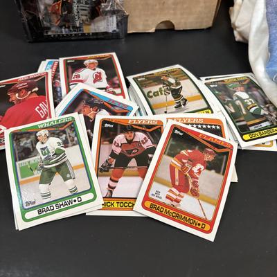 LOT 102: Vintage Philadelphia Flyers Memorabilia: T-shirts, Trading Cards, Team Photos, Stanley Cup Magazine along with a Box of Mixed...