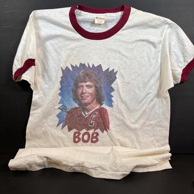 LOT 102: Vintage Philadelphia Flyers Memorabilia: T-shirts, Trading Cards, Team Photos, Stanley Cup Magazine along with a Box of Mixed...