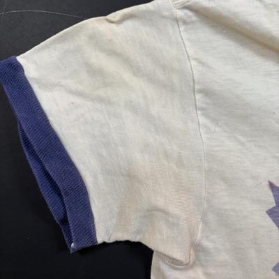 LOT 102: Vintage Philadelphia Flyers Memorabilia: T-shirts, Trading Cards, Team Photos, Stanley Cup Magazine along with a Box of Mixed...