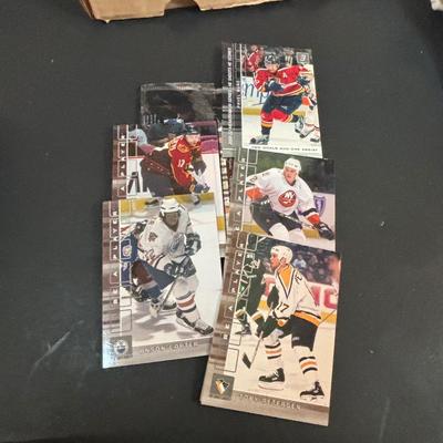 LOT 102: Vintage Philadelphia Flyers Memorabilia: T-shirts, Trading Cards, Team Photos, Stanley Cup Magazine along with a Box of Mixed...