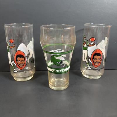 LOT 104: Philadelphia Eagles Memorabilia: Trading Cards, Team Photo, Glasses, 1977 Discover Magazine, Ticket Stub, Autograph's &...