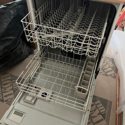 Sale Photo Thumbnail #153: Portable whirlpool dishwasher that has wheels and can be freely rolled around your cooking space.  The top is a flat surface that can be used as counter space.  
Power cable and hose are both on the back of the unit and retract into the unit when not in u