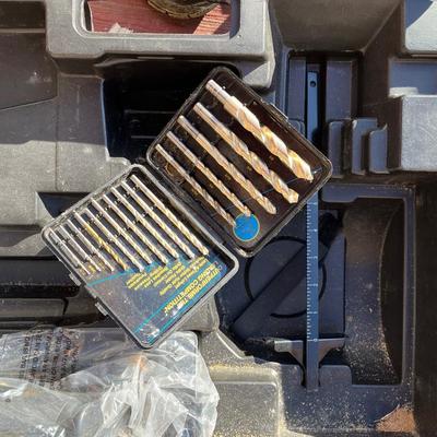 Sale Photo Thumbnail #116: Portable craftsman circular saw, impact drill, drill bit set, and work light set.  All use the same rechargeable batteries and charger base comes with the kit.  Everything stores safely in the carry case to protect your tools and makes transportation easy