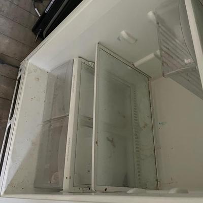 Sale Photo Thumbnail #127: Frigidaire refrigerator that has a freezer compartment and large capacity main compartment.  There is no ice maker but there is space to add one.