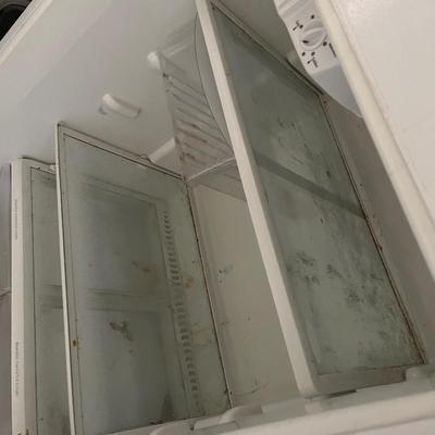 Sale Photo Thumbnail #124: Frigidaire refrigerator that has a freezer compartment and large capacity main compartment.  There is no ice maker but there is space to add one.