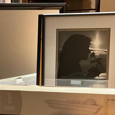 Mirror, framed picture, white wooden shelf