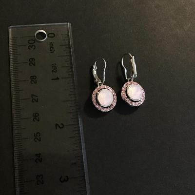 Pretty silver tone earrings with pink rhinestones