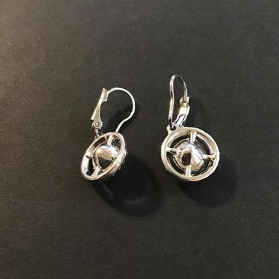 Pretty silver tone earrings with pink rhinestones