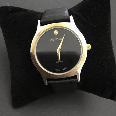 Vintage, gold and silver toned Japan movement genuine leather watch