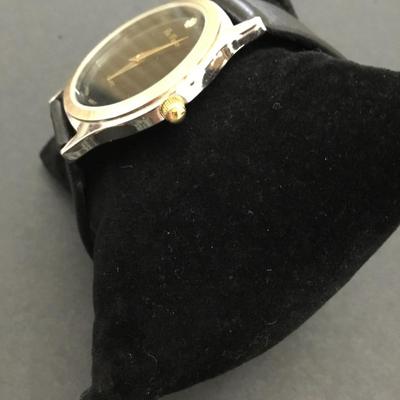 Vintage, gold and silver toned Japan movement genuine leather watch